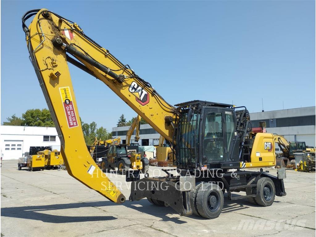 CAT MH3024-07 حفارات بعجل