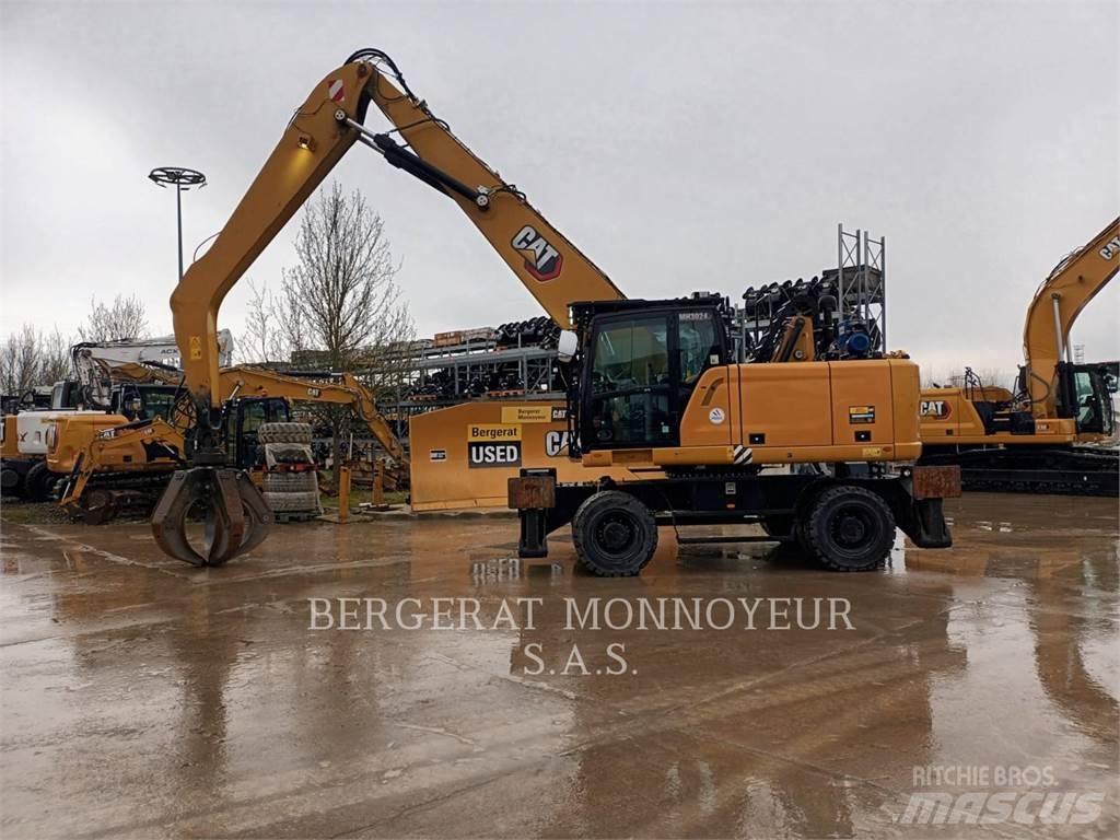 CAT MH3024-1 حفارات بعجل