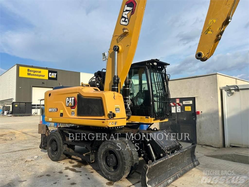 CAT MH3024-1 حفارات بعجل