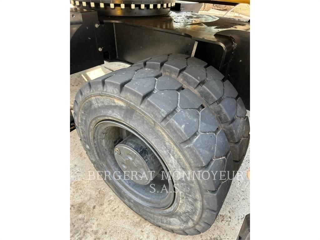 CAT MH3024-1 حفارات بعجل