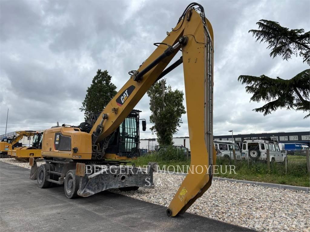 CAT MH3024-1 حفارات بعجل
