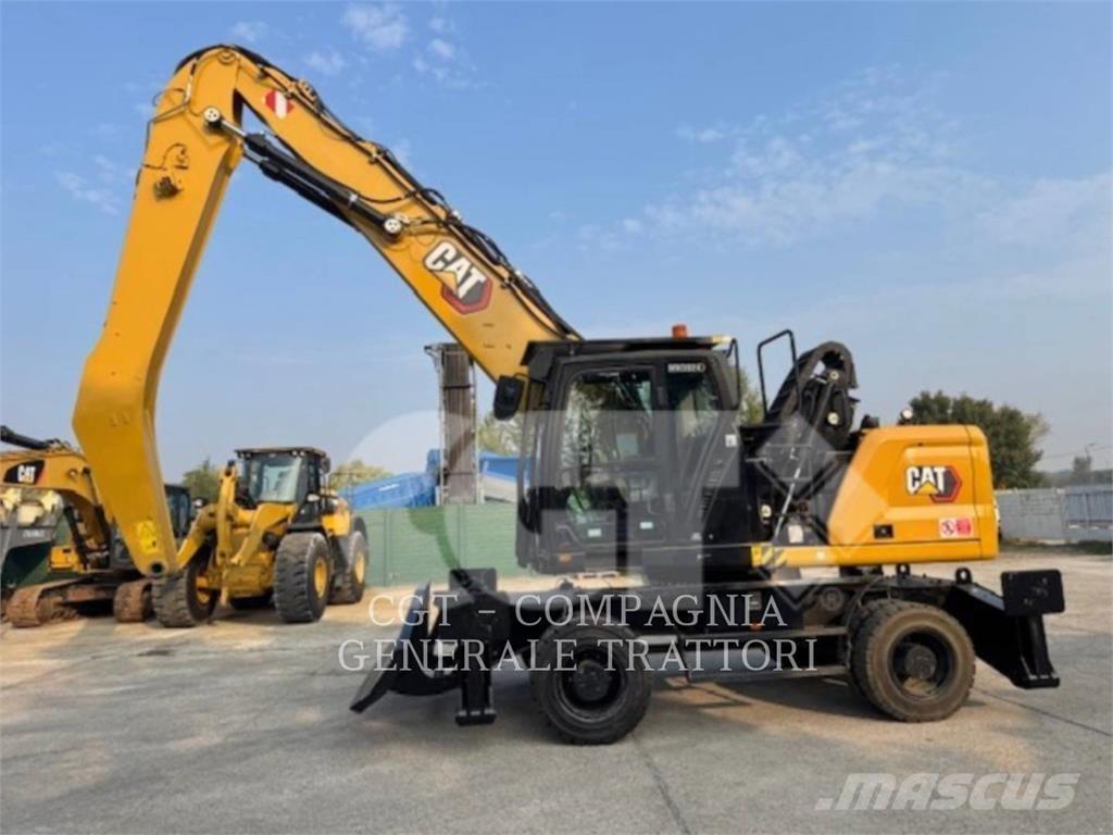 CAT MH3024NG حفارات بعجل