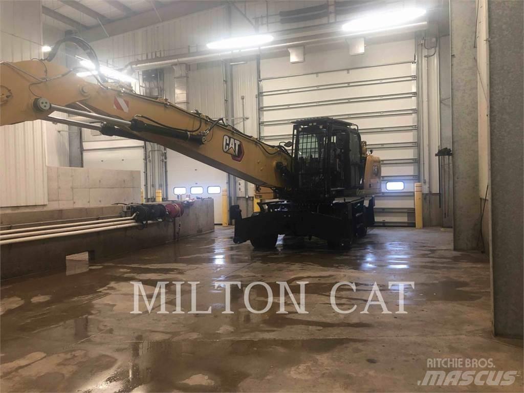 CAT MH3026 حفارات بعجل