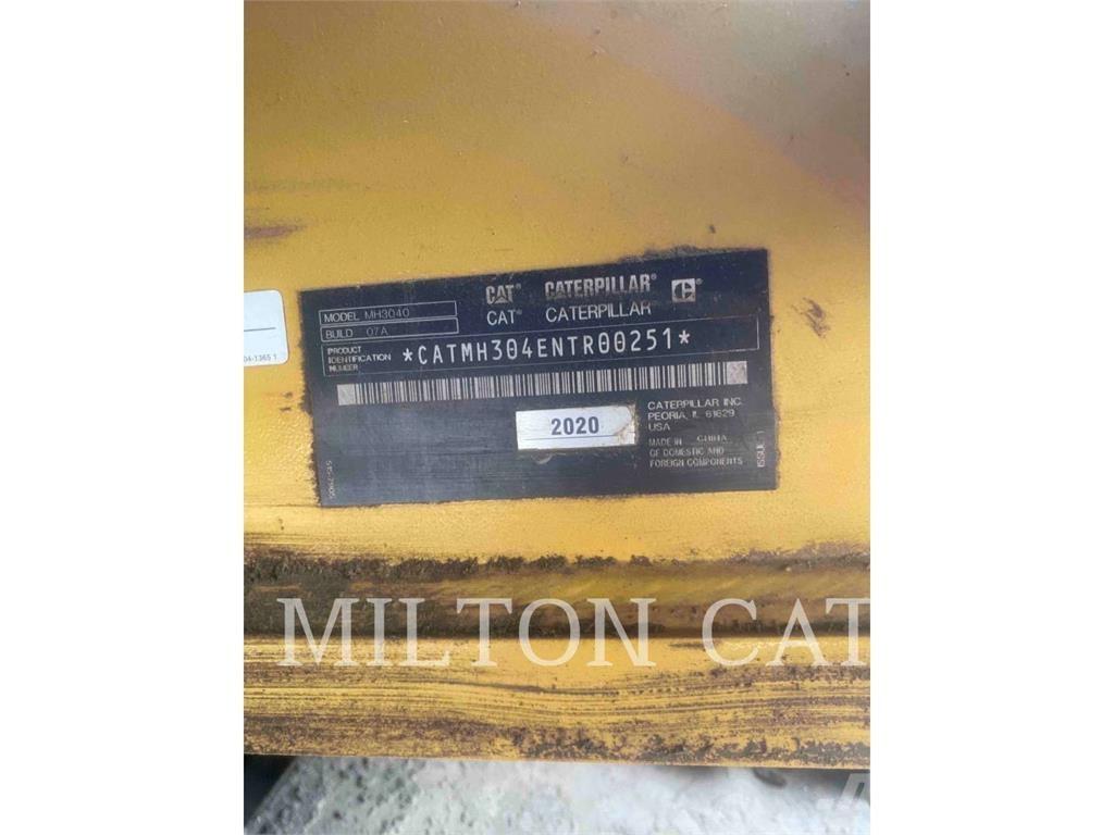 CAT MH3040-07 حفارات بعجل