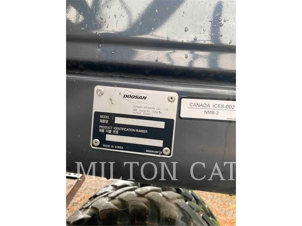 Doosan DX140W-5 حفارات بعجل