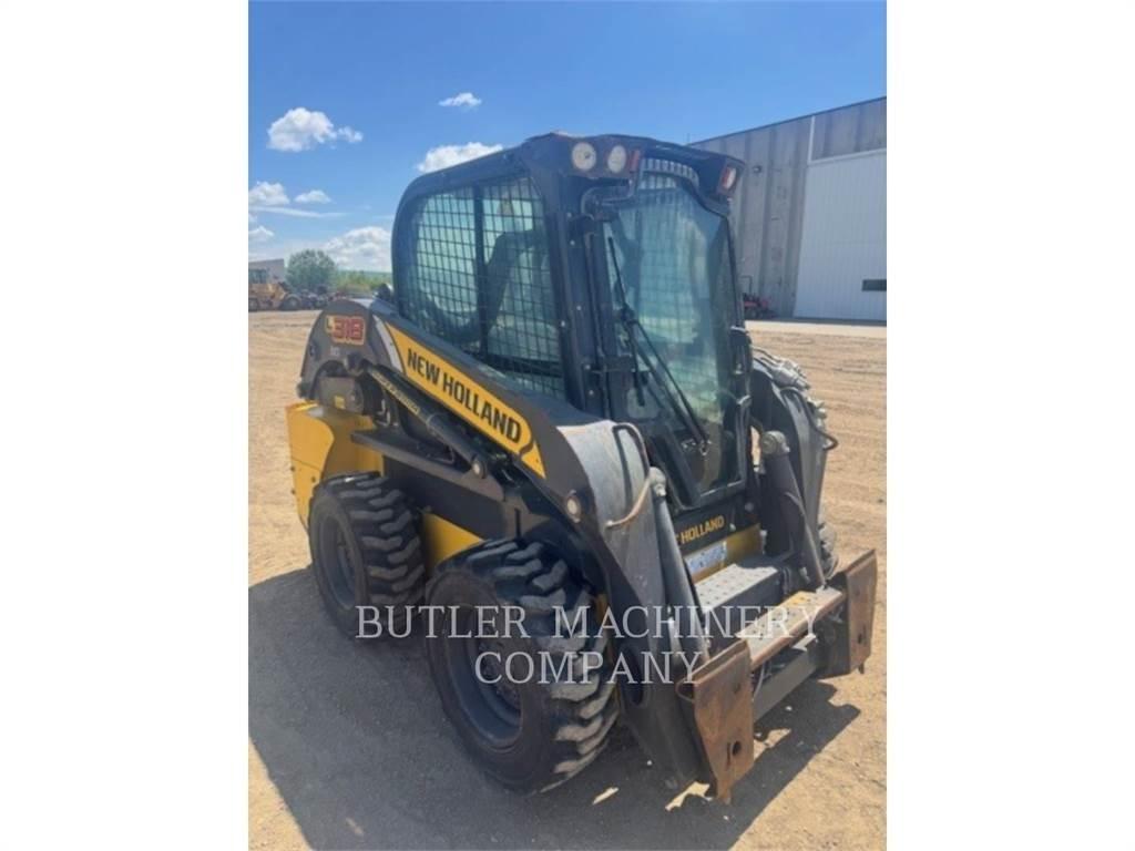 Ford / New Holland L318 لوادر انزلاقية التوجيه