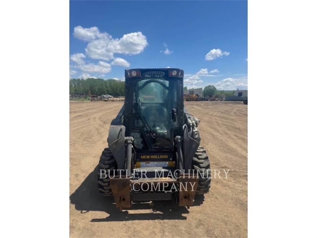 Ford / New Holland L318 لوادر انزلاقية التوجيه