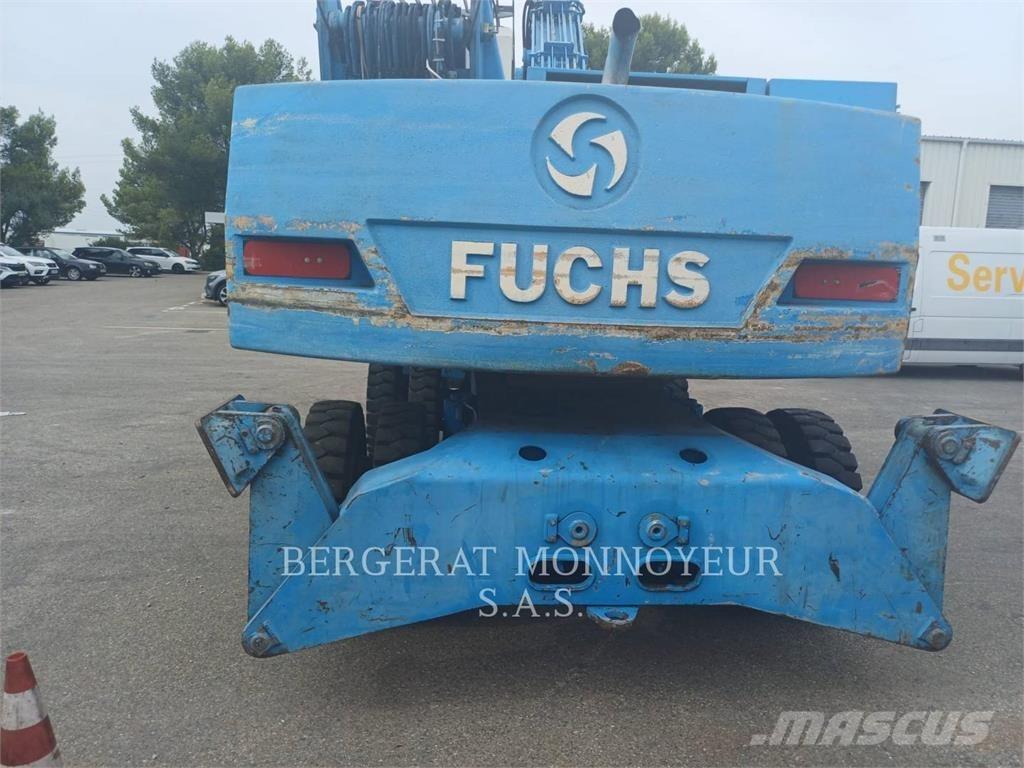 Fuchs MHL320 حفارات بعجل