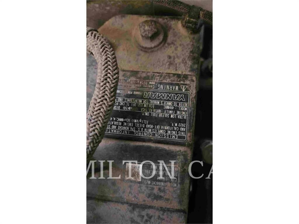 John Deere 318G لوادر انزلاقية التوجيه