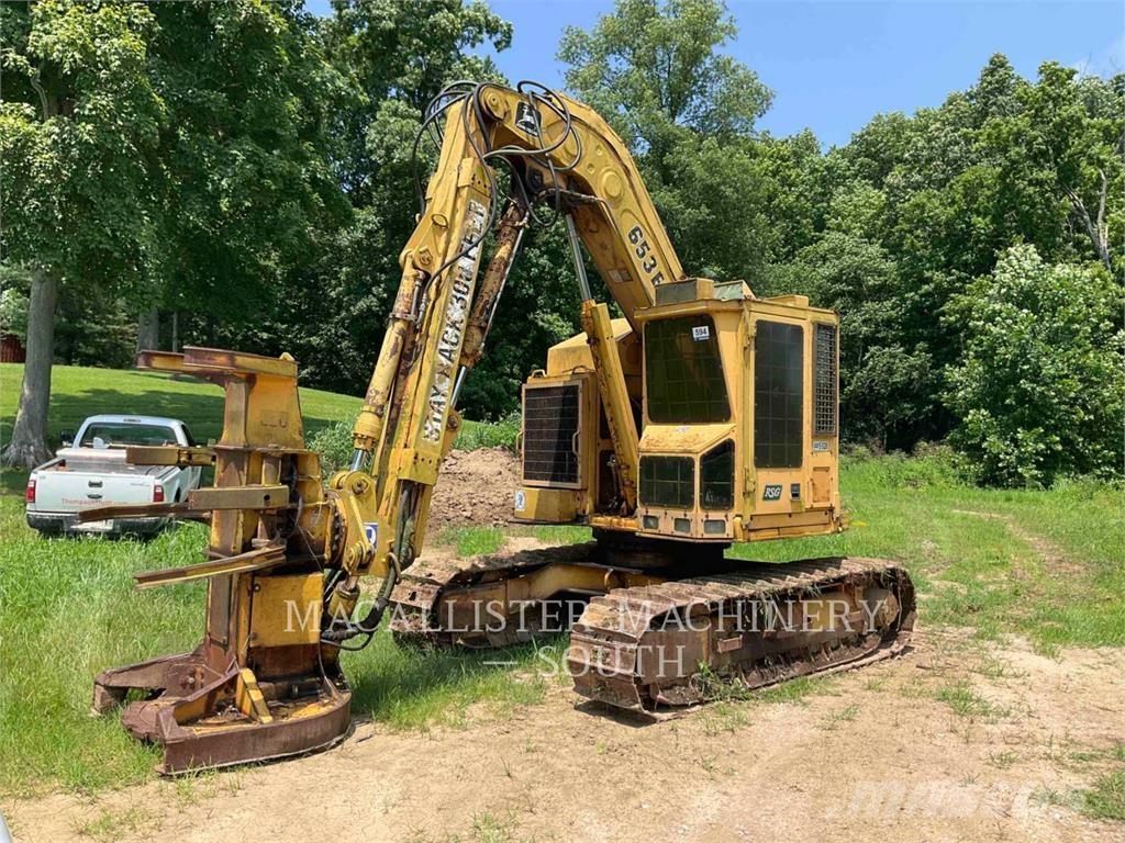 John Deere 653E قاطعات وجامعات الأشجار