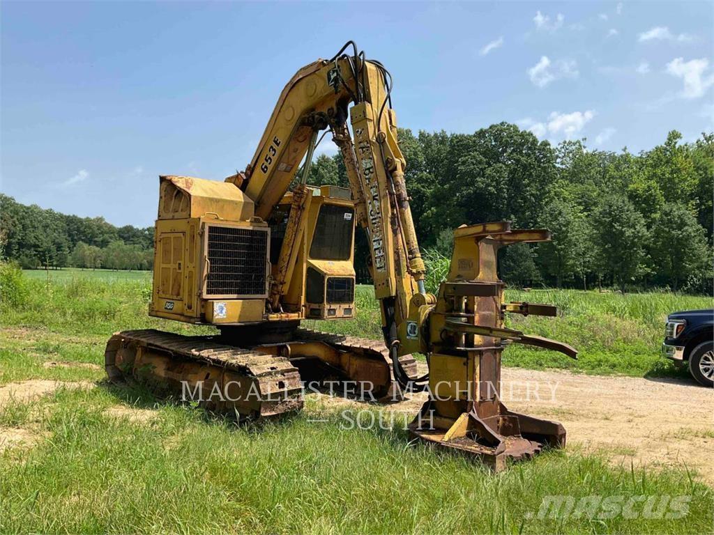 John Deere 653E قاطعات وجامعات الأشجار