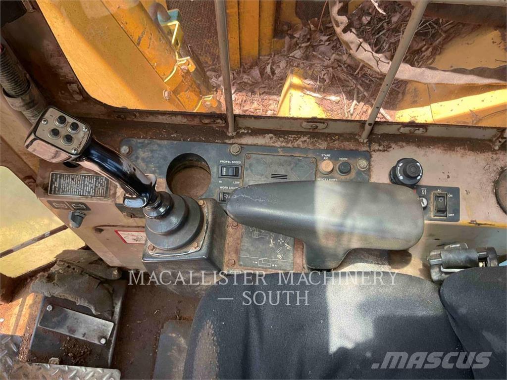 John Deere 653E قاطعات وجامعات الأشجار