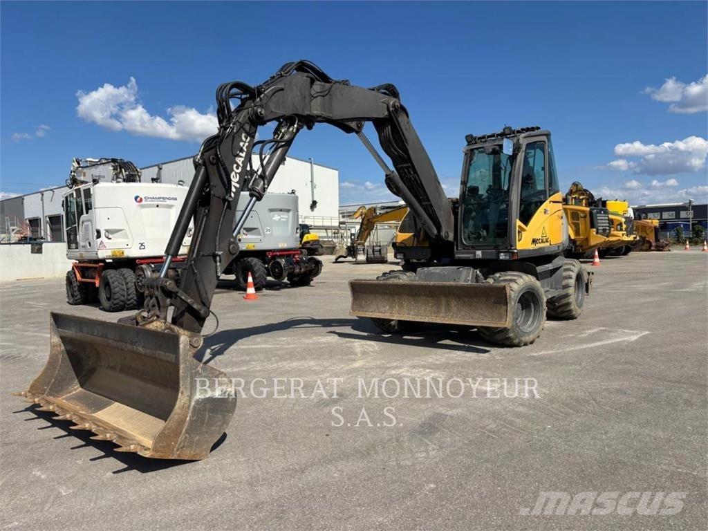 Mecalac 714MW حفارات بعجل
