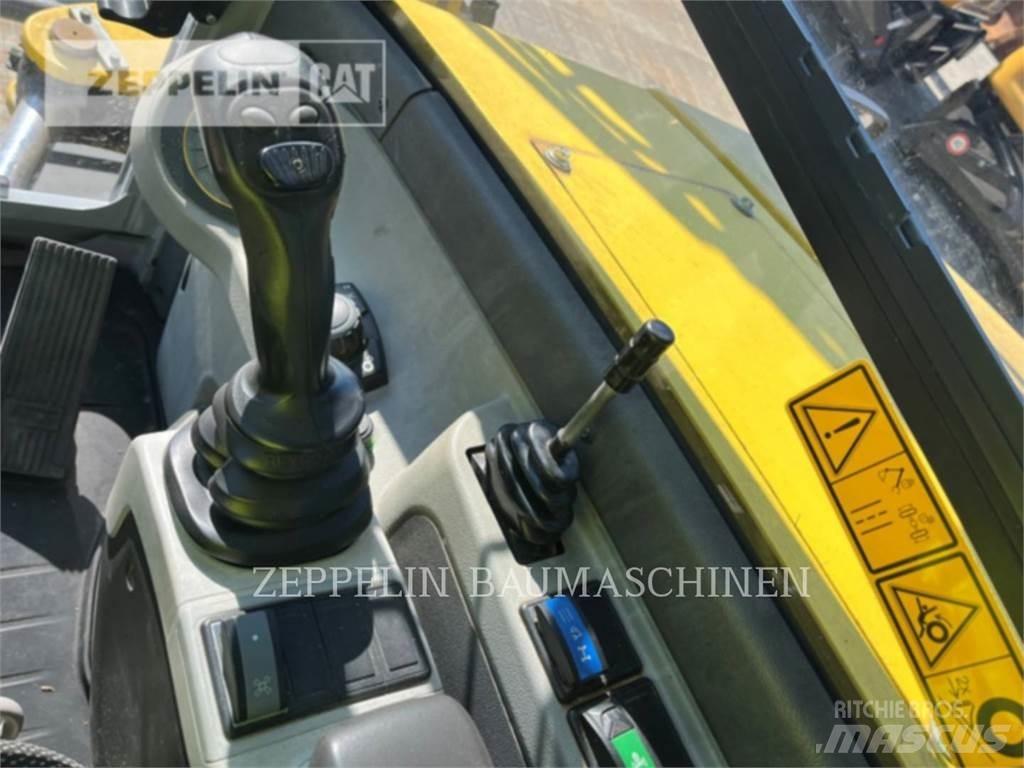 Neuson EW100 حفارات بعجل