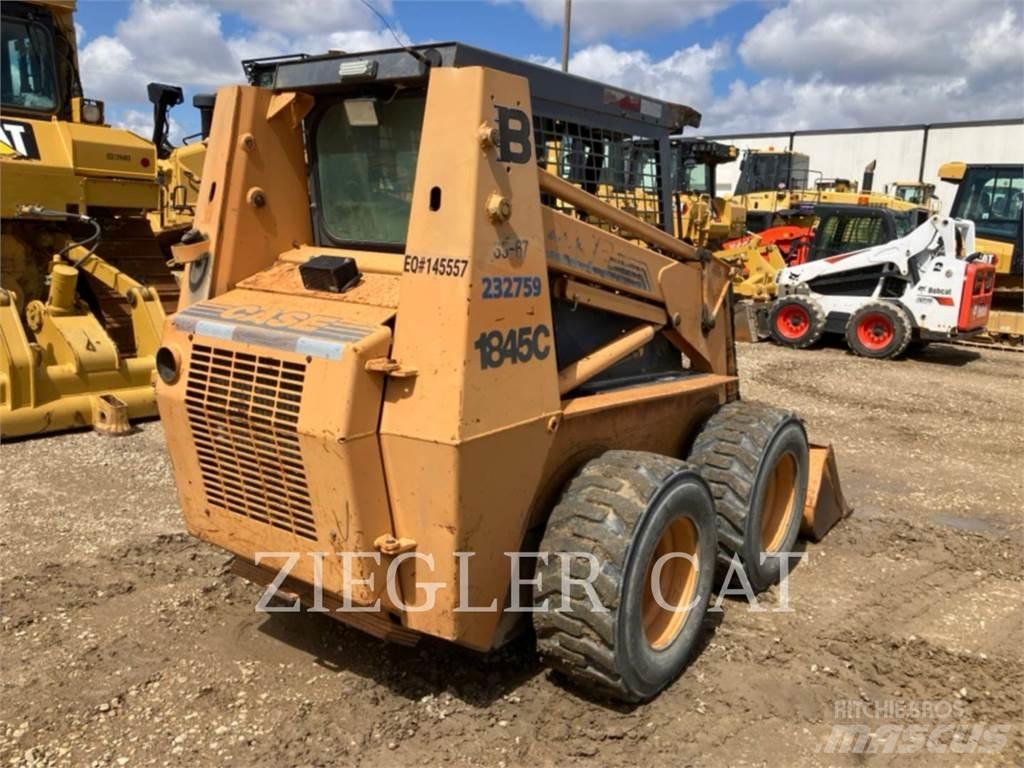 New Holland 1845 لوادر انزلاقية التوجيه