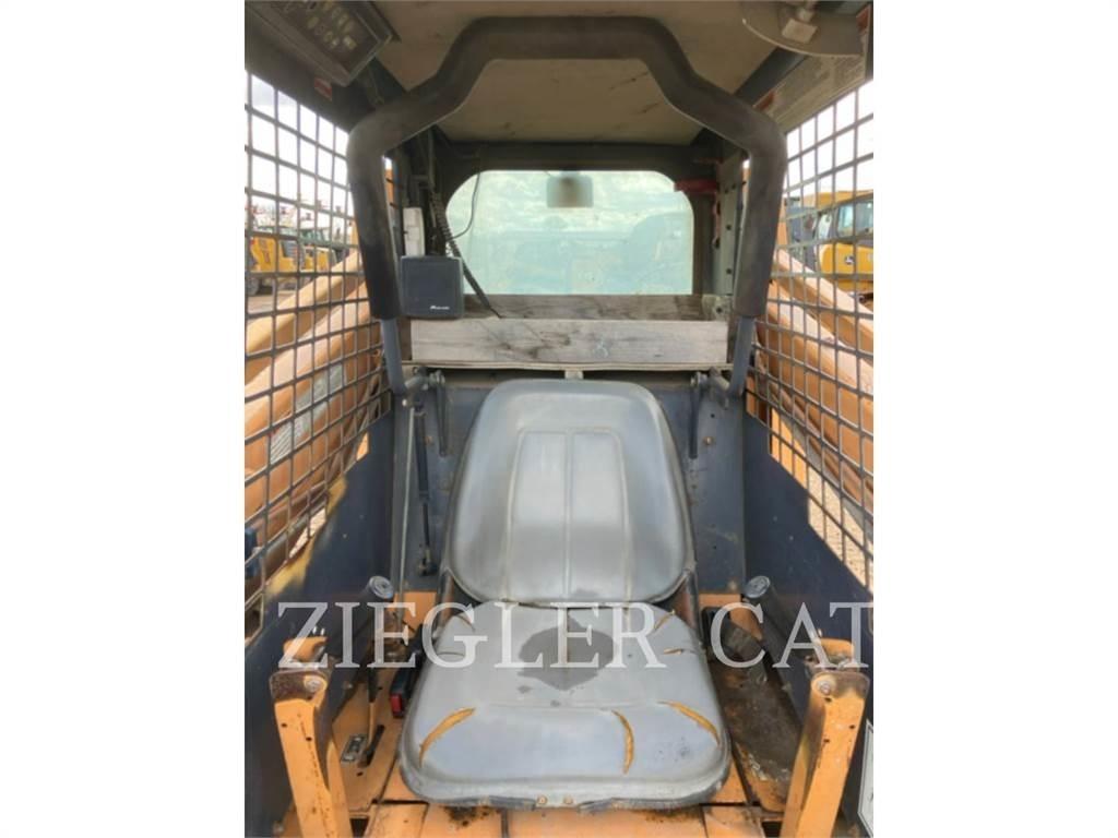 New Holland 1845 لوادر انزلاقية التوجيه
