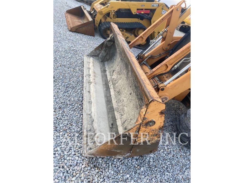 New Holland 590SM لوادر ذات جرافات عكسية