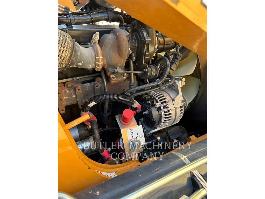 New Holland 590SN لوادر ذات جرافات عكسية