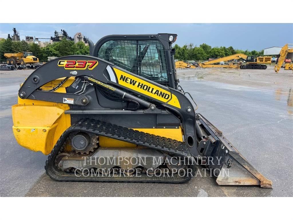 New Holland C237 لوادر زحافة