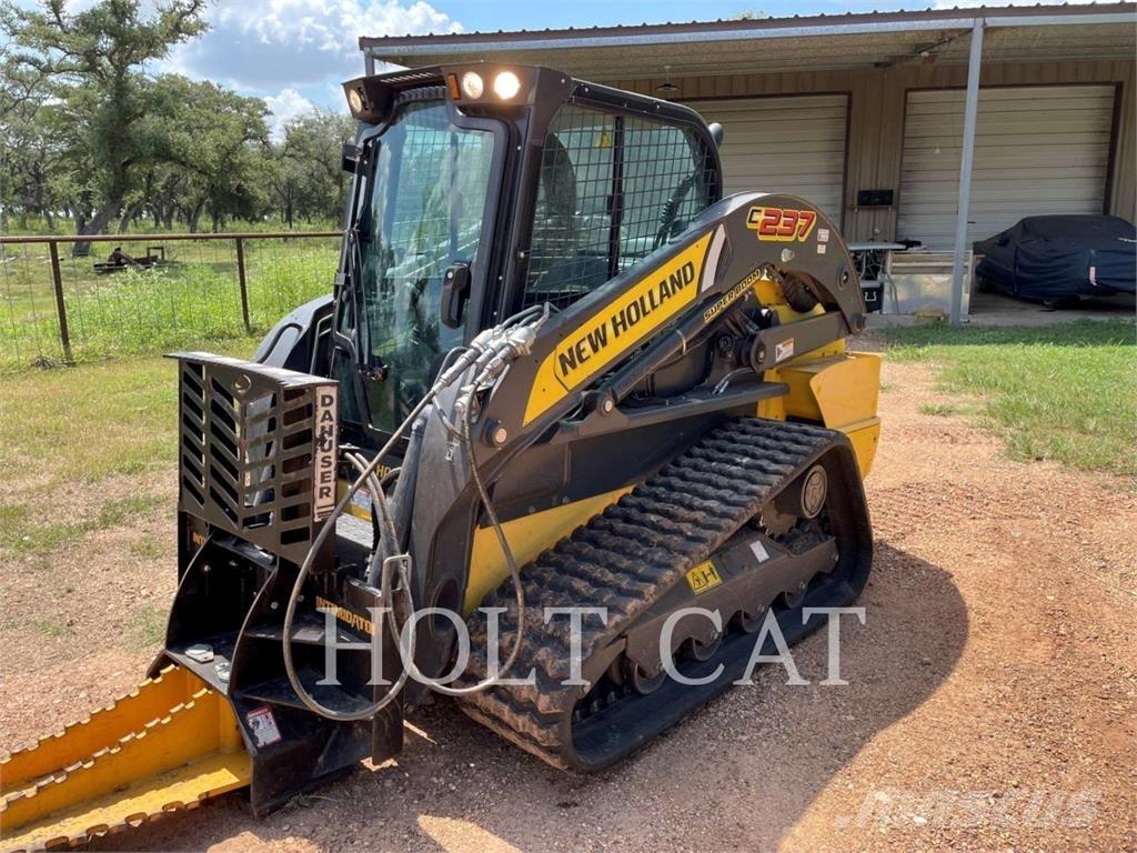 New Holland C237 لوادر زحافة