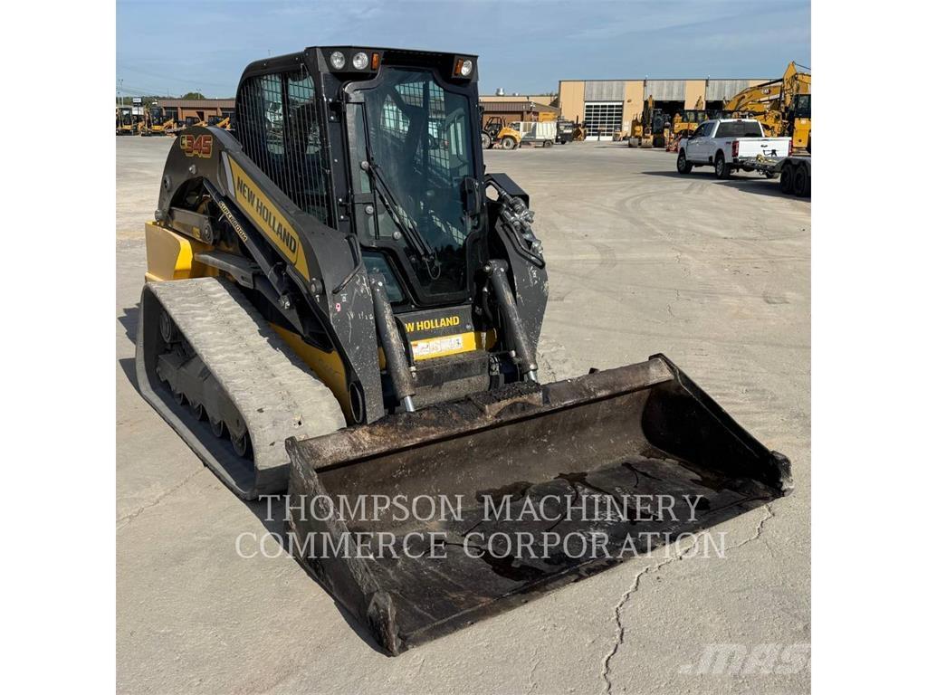 New Holland C345 لوادر زحافة