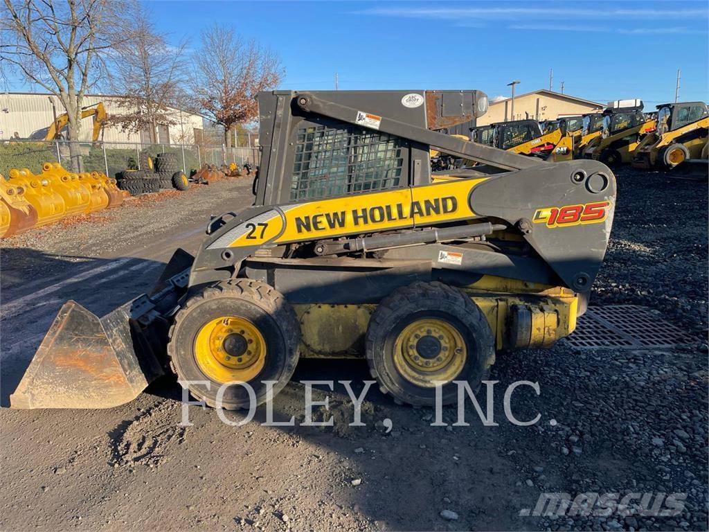 New Holland L185 لوادر انزلاقية التوجيه
