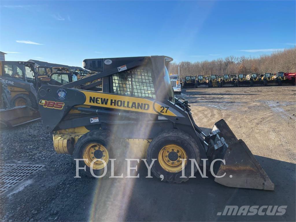 New Holland L185 لوادر انزلاقية التوجيه