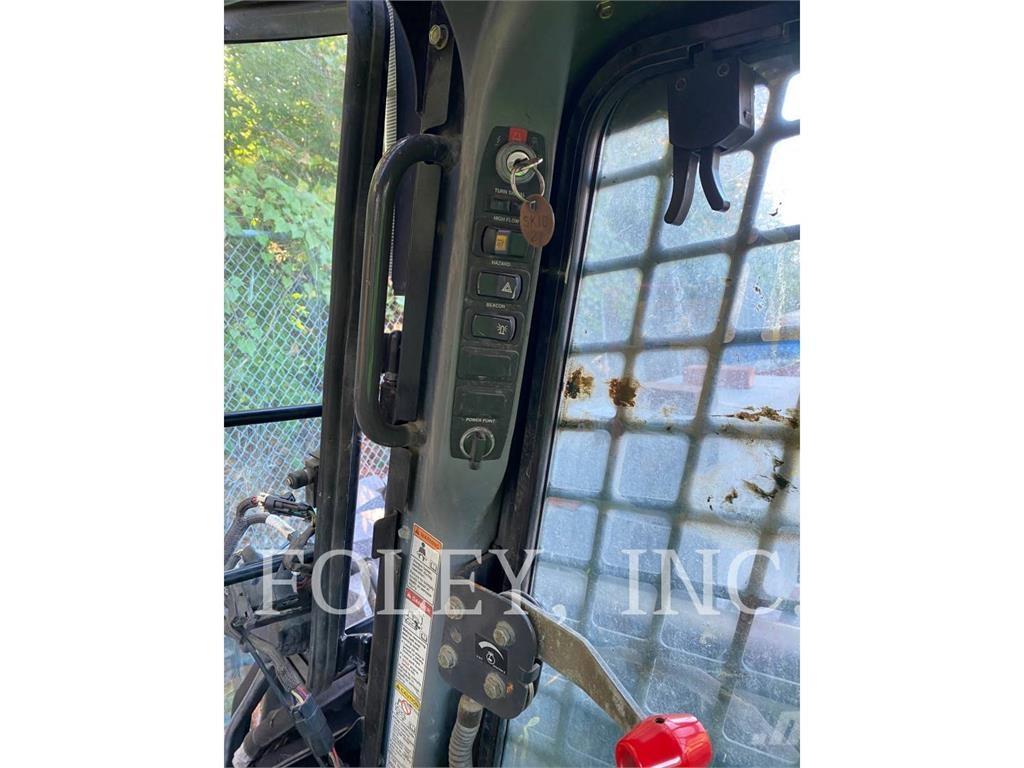 New Holland L185 لوادر انزلاقية التوجيه