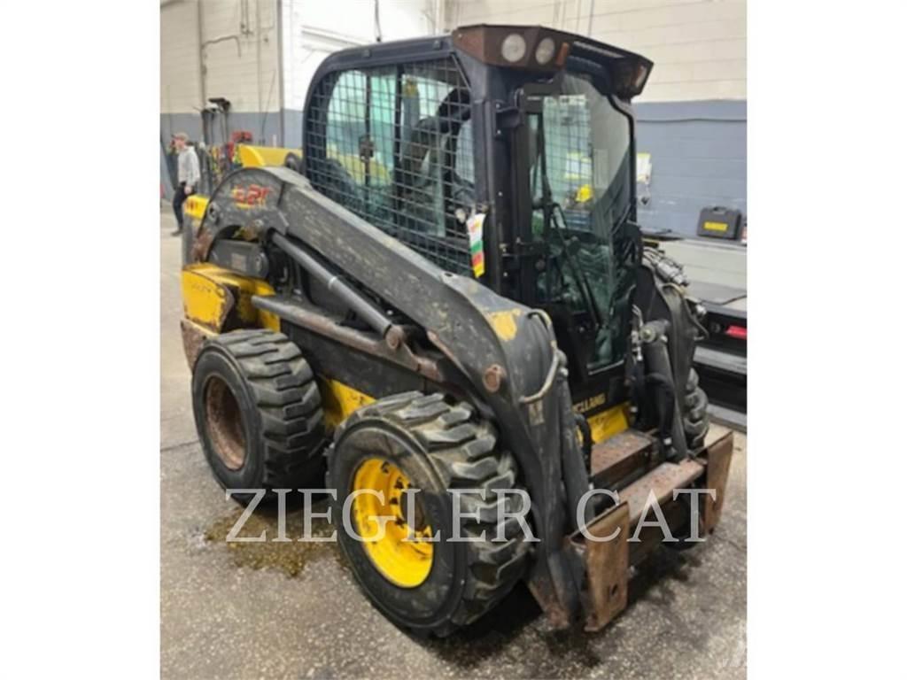 New Holland L220 لوادر انزلاقية التوجيه