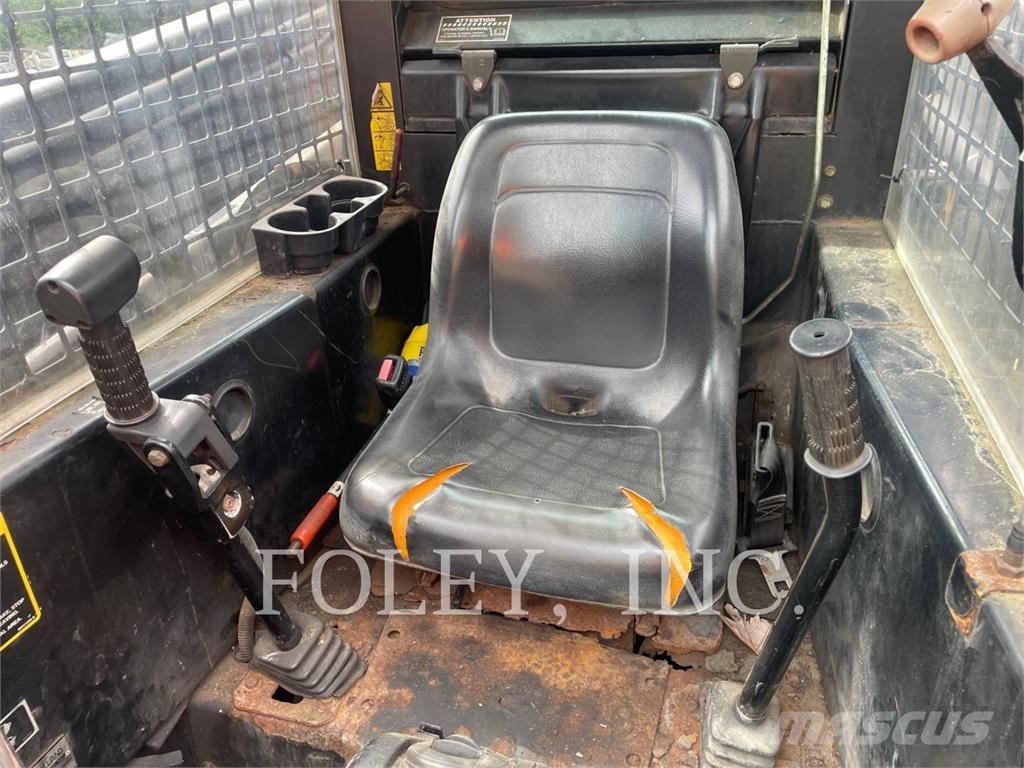 New Holland LX885 لوادر انزلاقية التوجيه