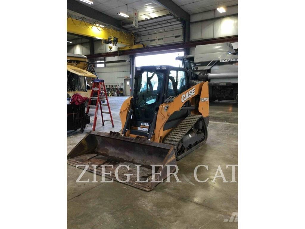 New Holland TR270B لوادر زحافة