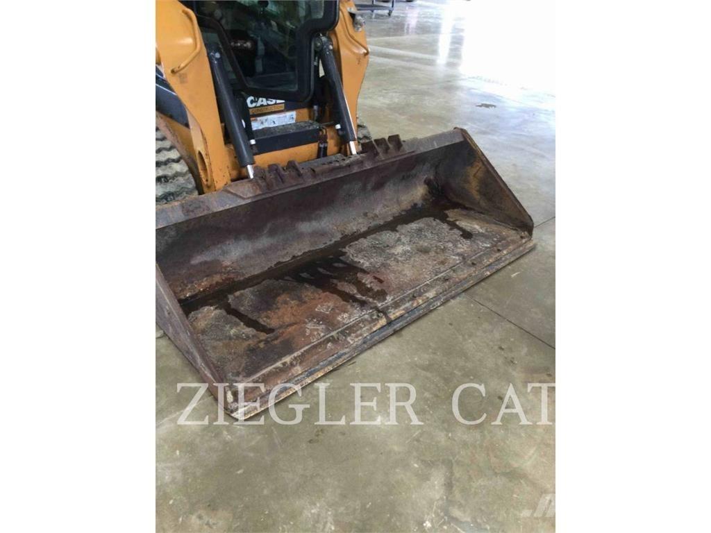 New Holland TR270B لوادر زحافة
