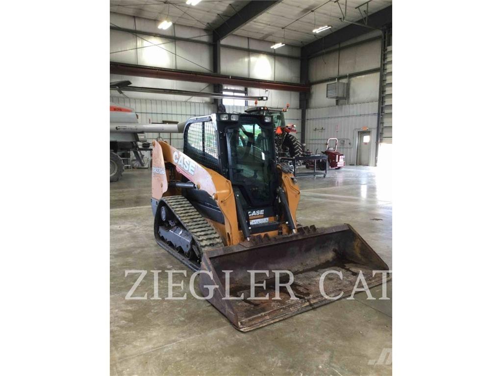 New Holland TR270B لوادر زحافة
