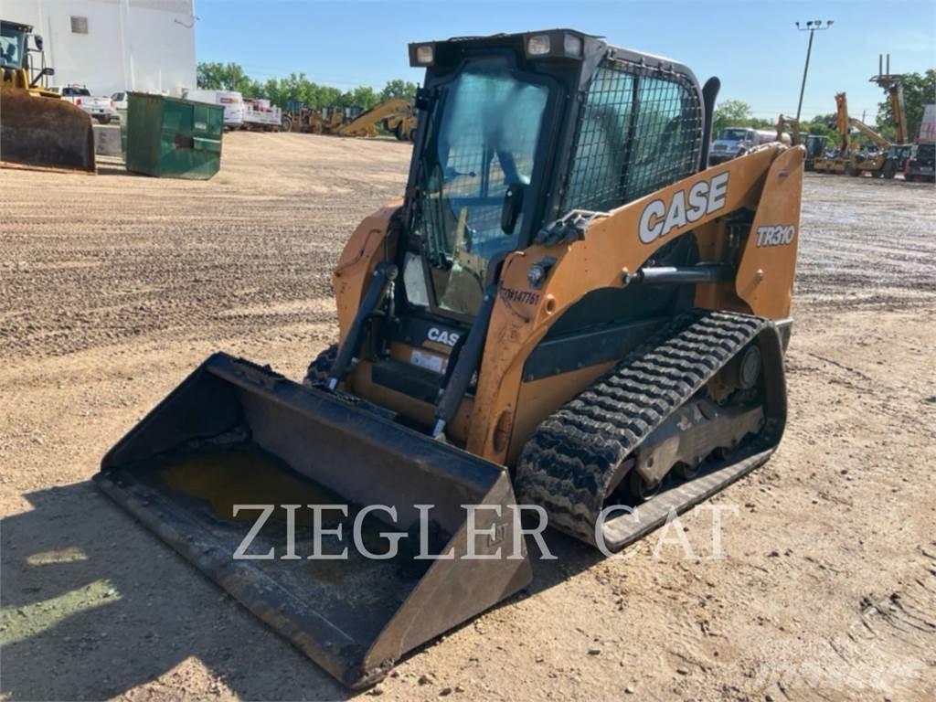 New Holland TR310 لوادر زحافة