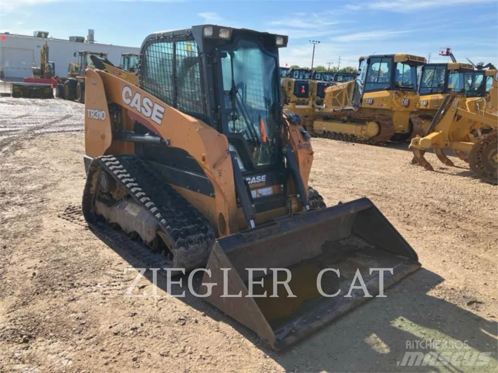 New Holland TR310 لوادر زحافة