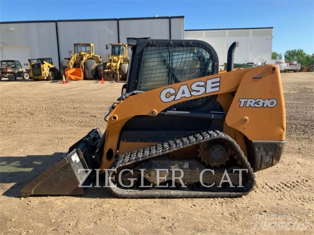 New Holland TR310 لوادر زحافة
