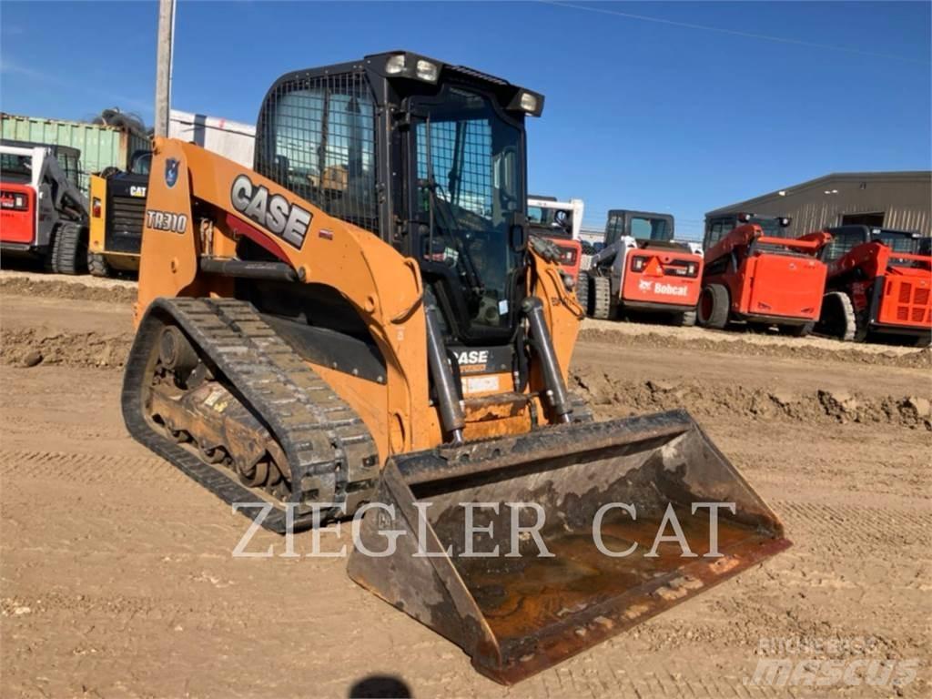 New Holland TR310 لوادر زحافة