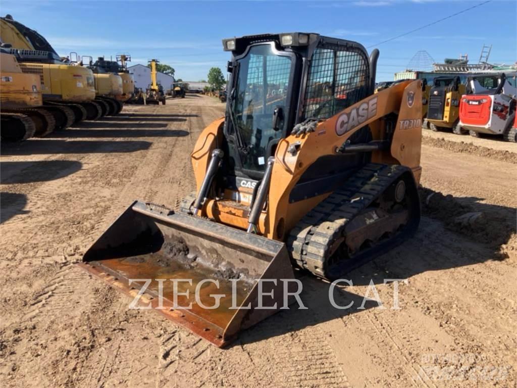 New Holland TR310 لوادر زحافة