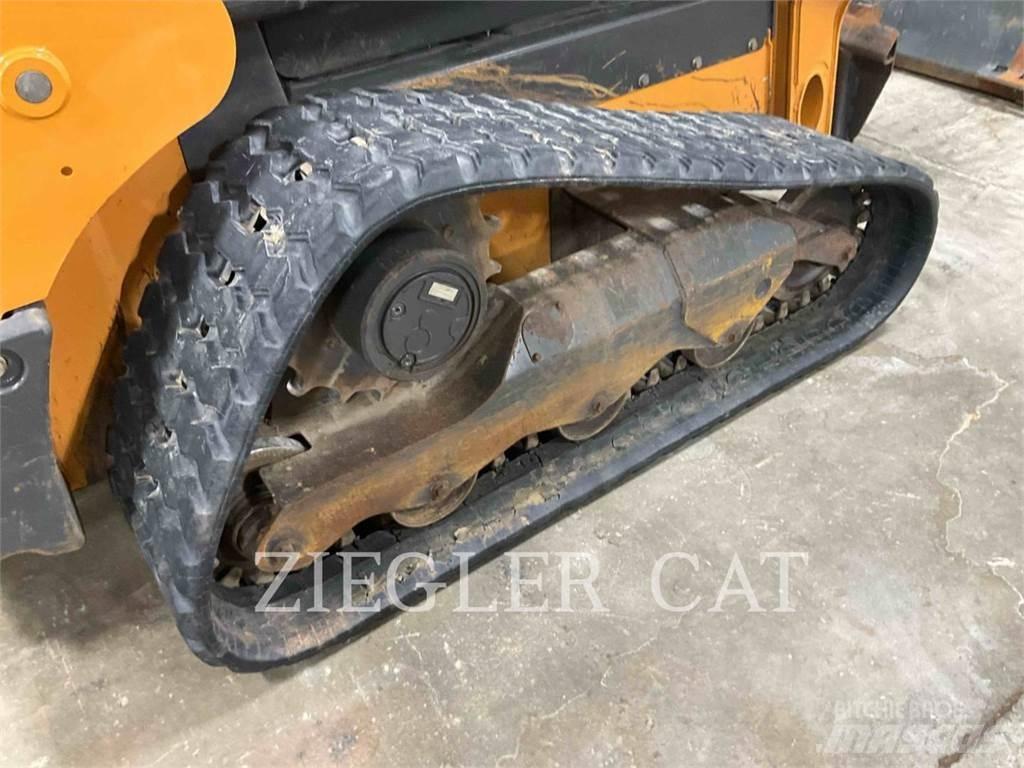 New Holland TR310B لوادر زحافة