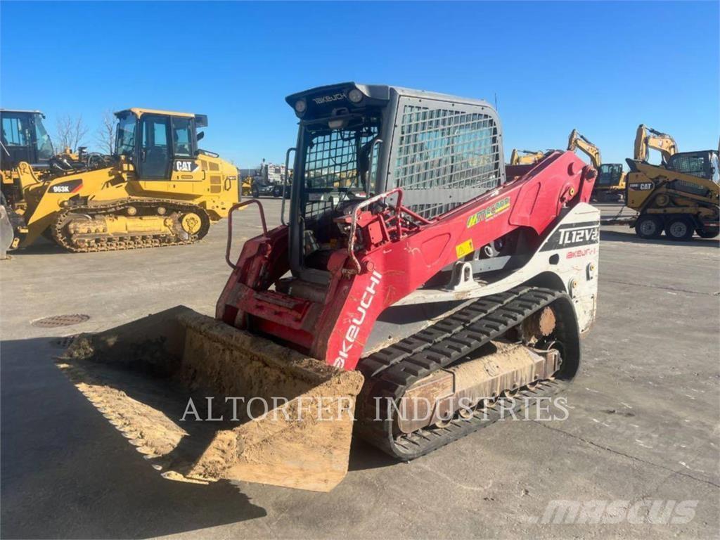 Takeuchi TL-12 لوادر انزلاقية التوجيه