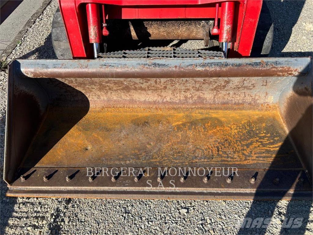 Takeuchi TL12 لوادر زحافة