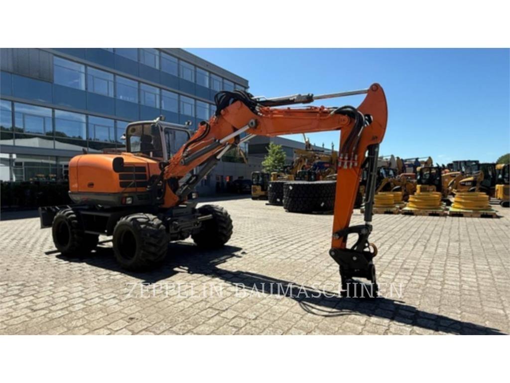 Wacker EW100 حفارات بعجل