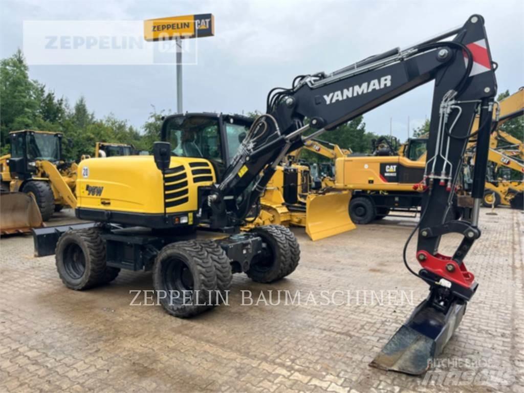 Yanmar B95W حفارات بعجل