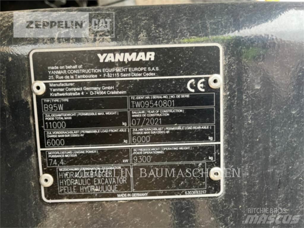 Yanmar B95W حفارات بعجل