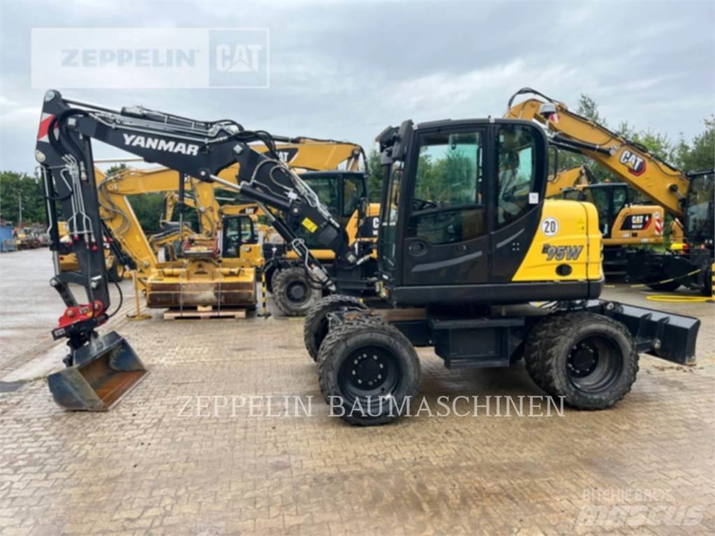 Yanmar B95W حفارات بعجل