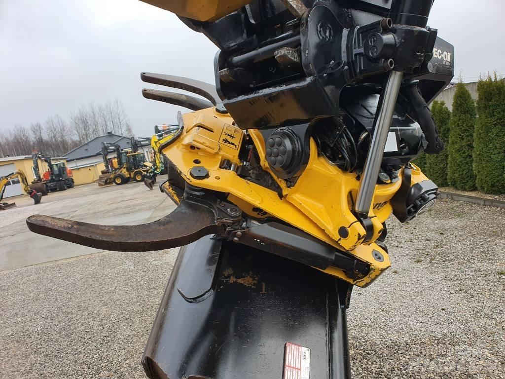 CAT M 318 F حفارات بعجل