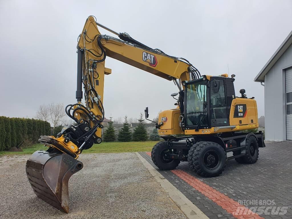 CAT M 318 F حفارات بعجل