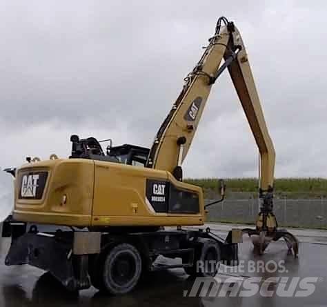 CAT MH3024 مناولات المخلفات / مناولات صناعية