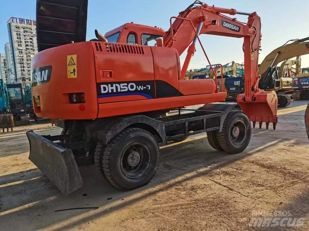 Doosan 150 W-7 حفارات بعجل