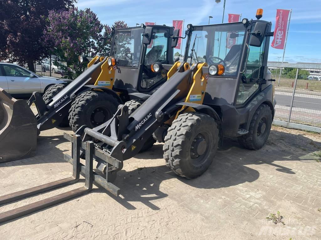 Mecalac AX 700 لوادر بعجل
